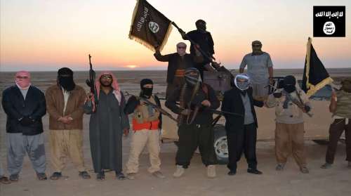 isis-militants-wave-a-flag-in-iraq-data